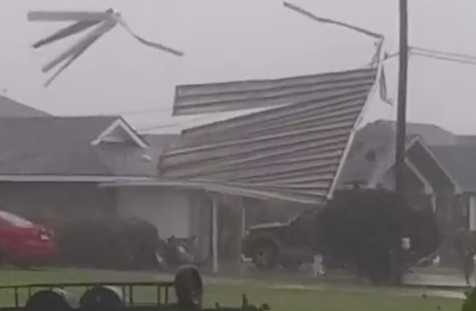 Cover Garage blowing apart during hurricane Ida