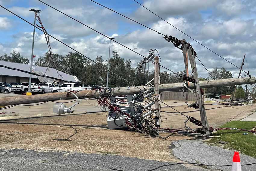 Downed power pole in houma after Hurricane Ida